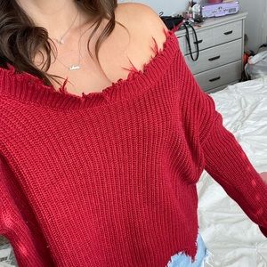 Red distressed sweater